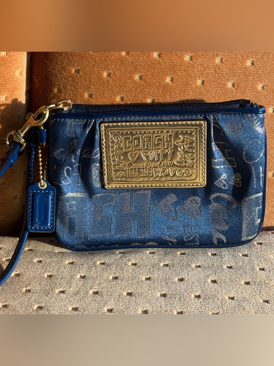 Coach Handbags - Coach Poppy Navy Blue Wristlet with Gold Creed